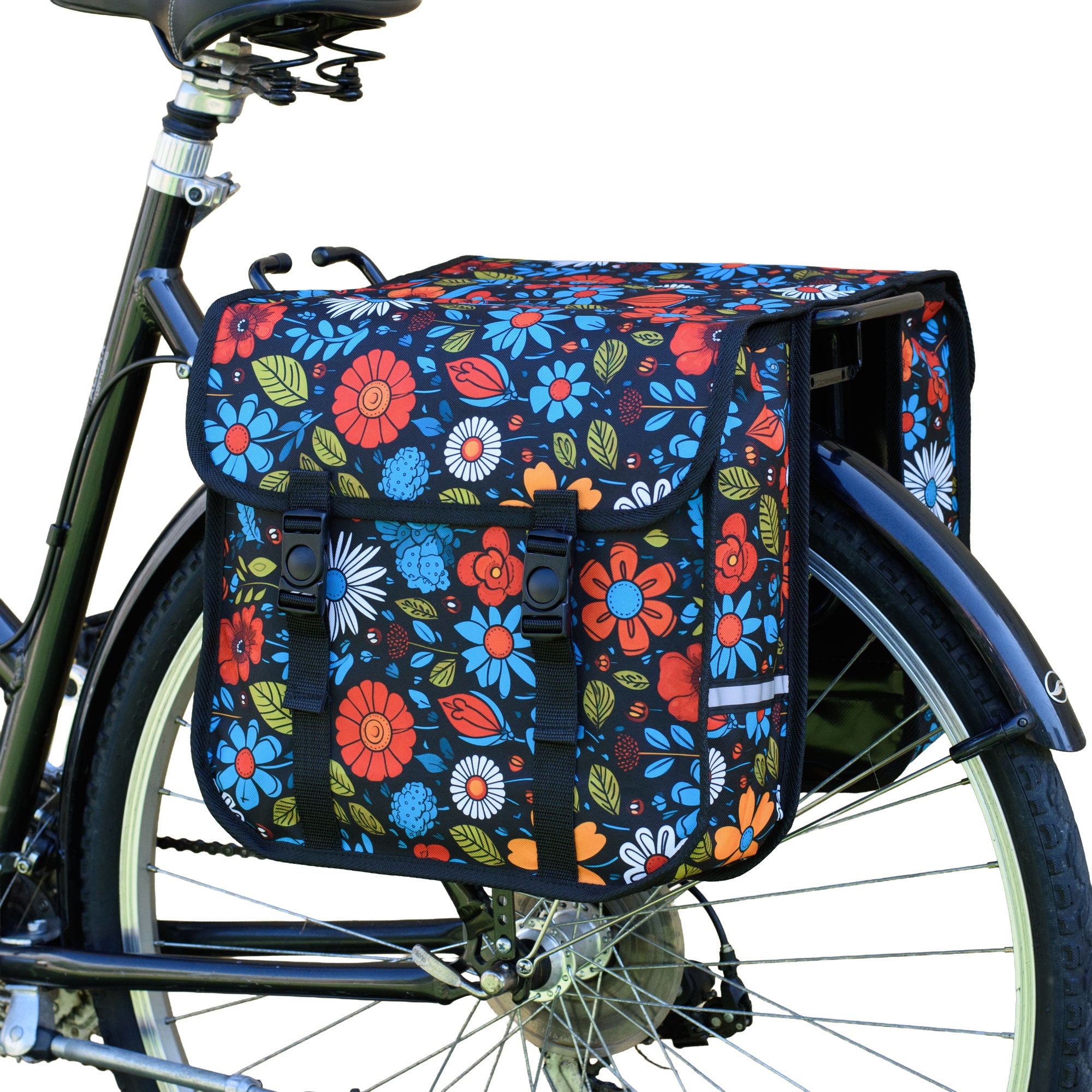 A floral double pannier bag attached to the rear rack of a bicycle.